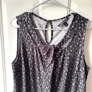 Gray and black animal print knit sleeveless top with cutout detail
